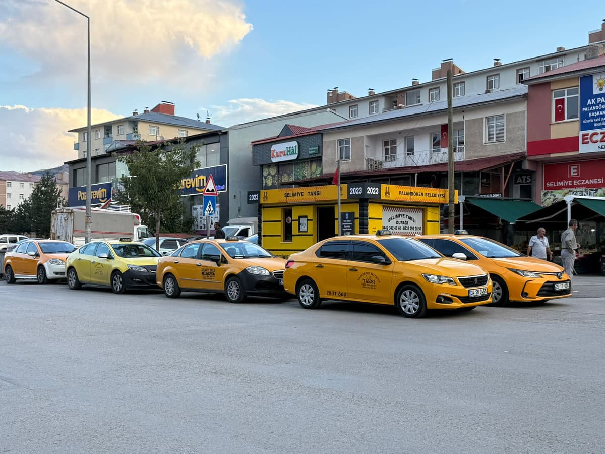 Clean and spacious interior of a taxi.